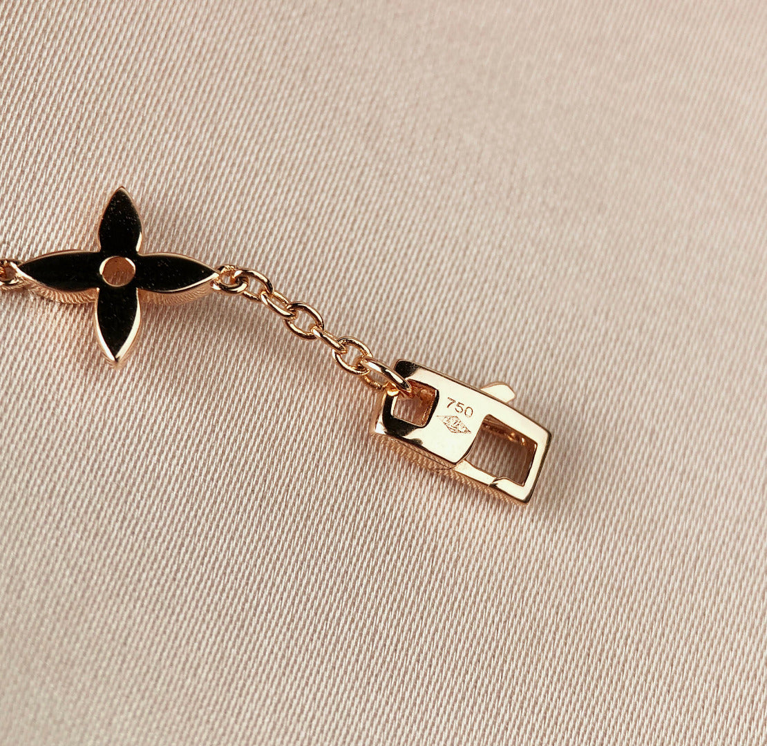 GlowSTAR AND SUN 7 MOTIFS GOLD BRACELET