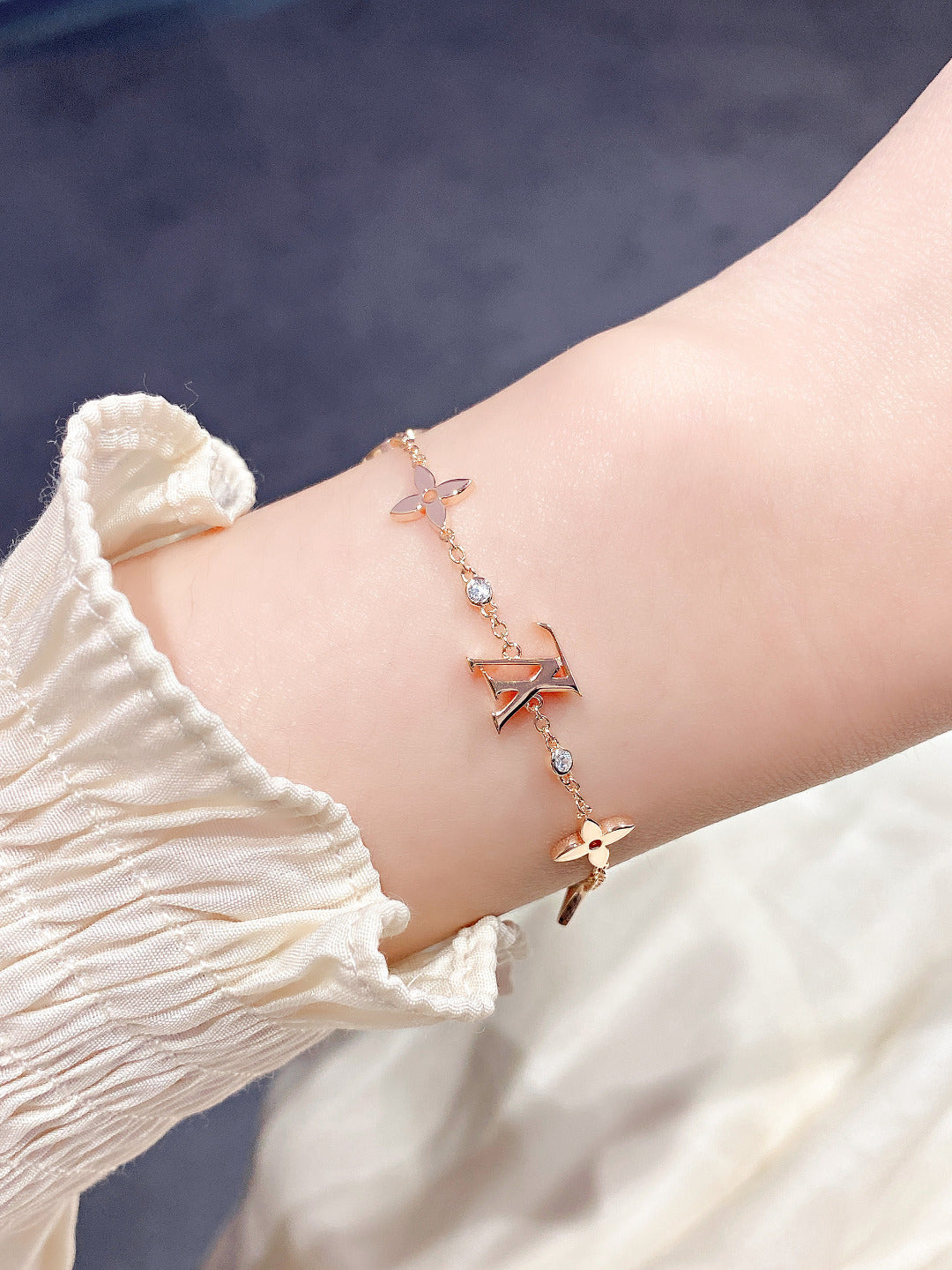 GlowSTAR AND SUN 7 MOTIFS GOLD BRACELET