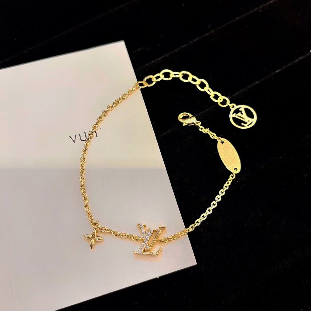 GlowLOGO STAR MOTIF GOLD BRACELET