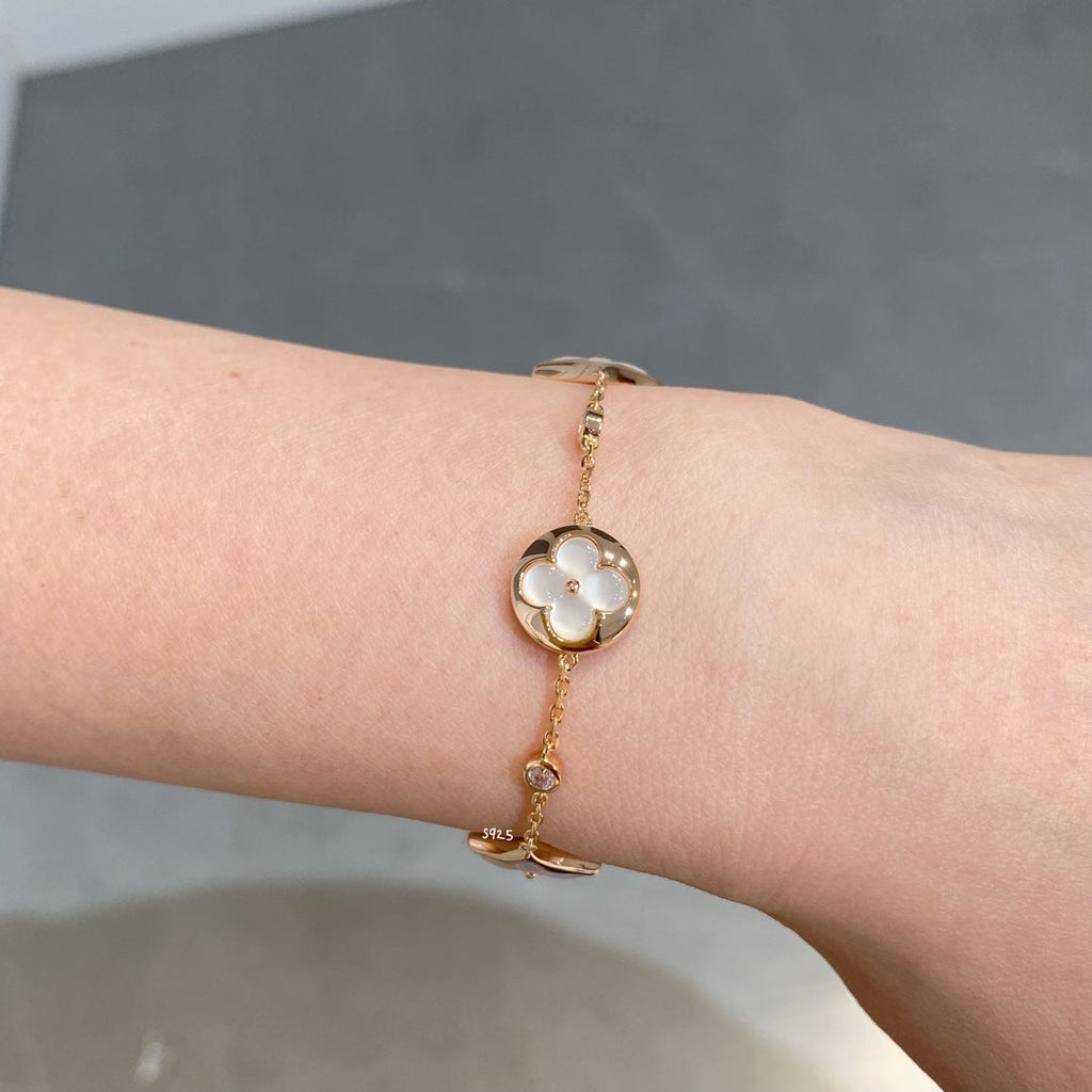 GlowSTAR AND SUN 4 MOTIF WHITE MOP PINK GOLD BRACELET