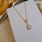 GlowSTAR AND SUN WHITE MOP 2 MOTIF PINK GOLD NECKLACE