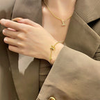 GlowLOGO STAR MOTIF GOLD BRACELET