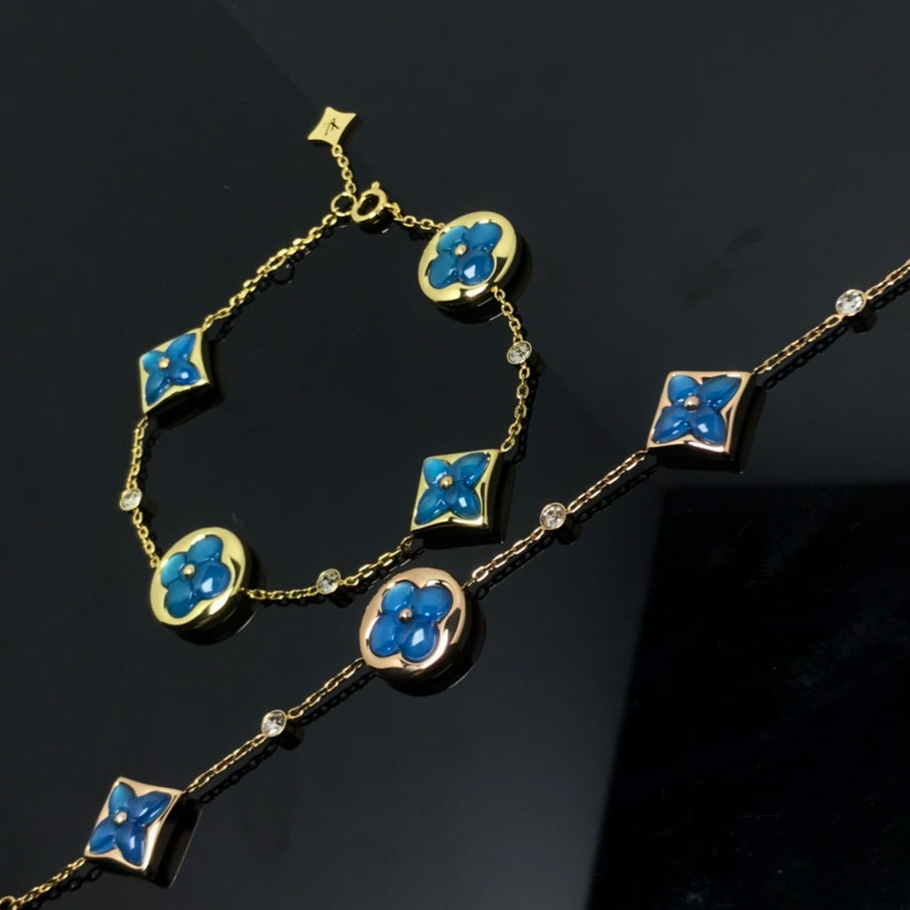 GlowSTAR AND SUN 4 MOTIF BLUE BRACELET